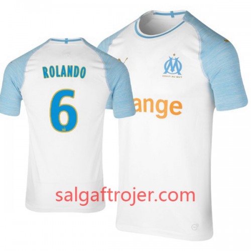 Olympique de Marseille Fodboldtrøjer Rolando 6 Hjemmebanesæt 2018/19 Kort ærmer Olympique de Marseille Fodboldtrøjer Rolando 6 Hjemmebanesæt 2018/19 Kort ærmer